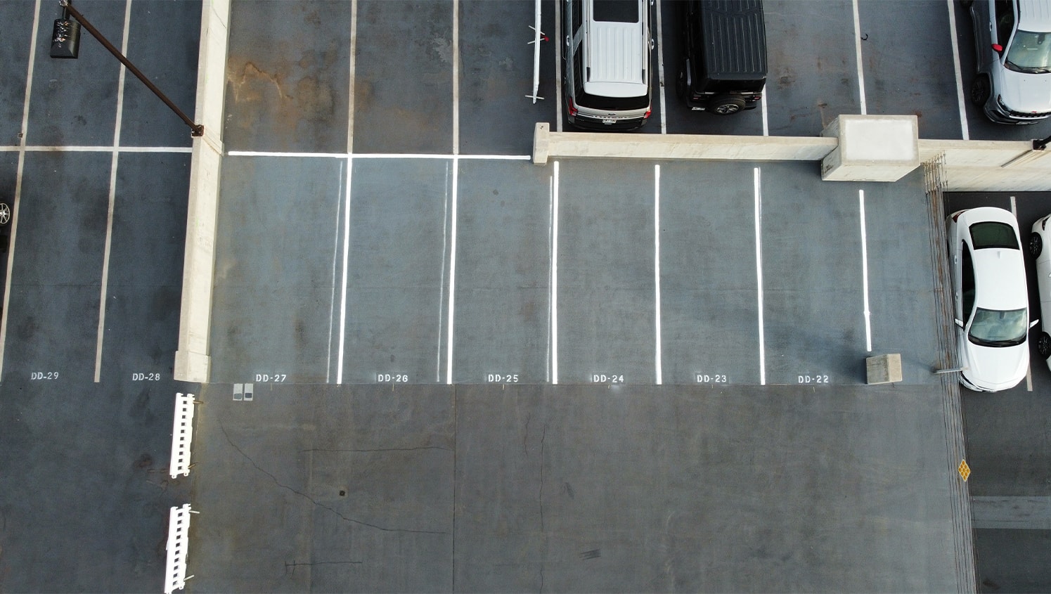aerial view of parking lot with freshly painted parking spots