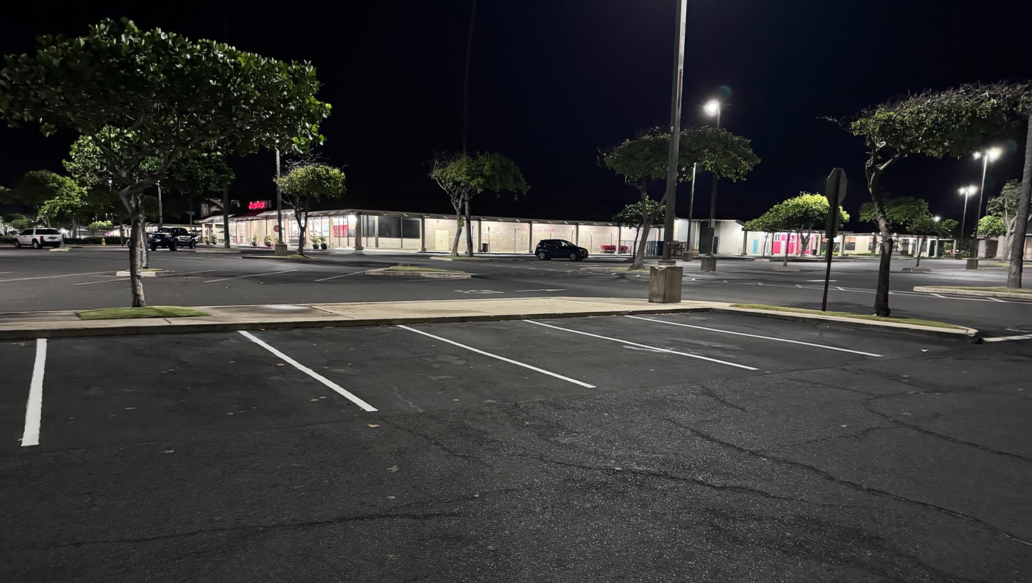 parking spots with freshly painted line markings for O'Reilly Auto Parts